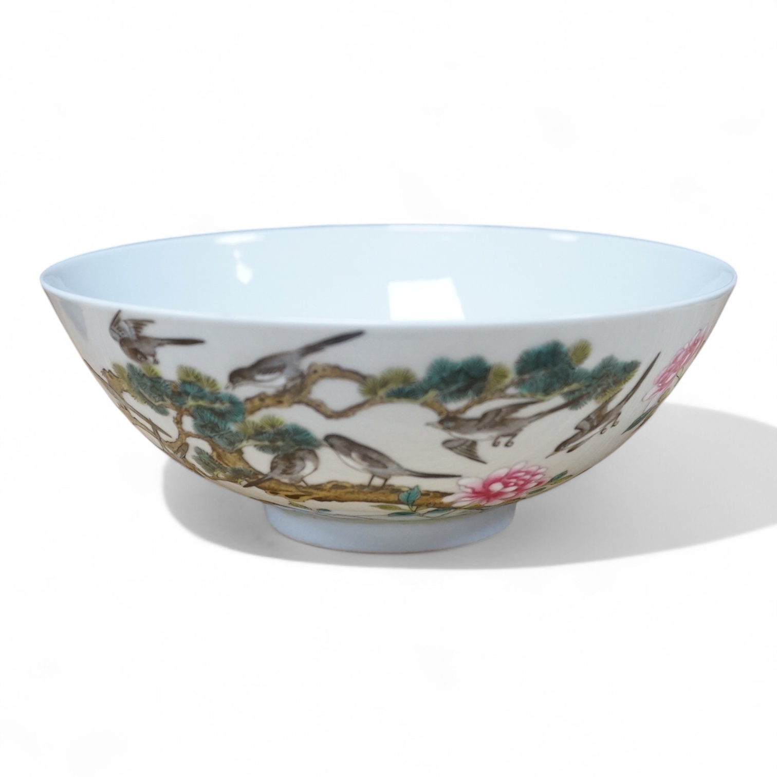 A Chinese famille rose bowl enamelled with birds and flowers, 15cm in diameter